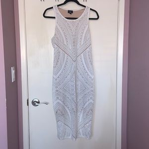 Cut design white dress with beige lining under